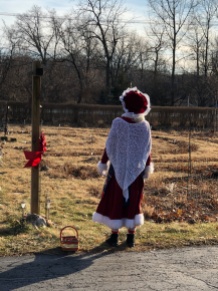 Mrs. Claus takes a pause before walking.